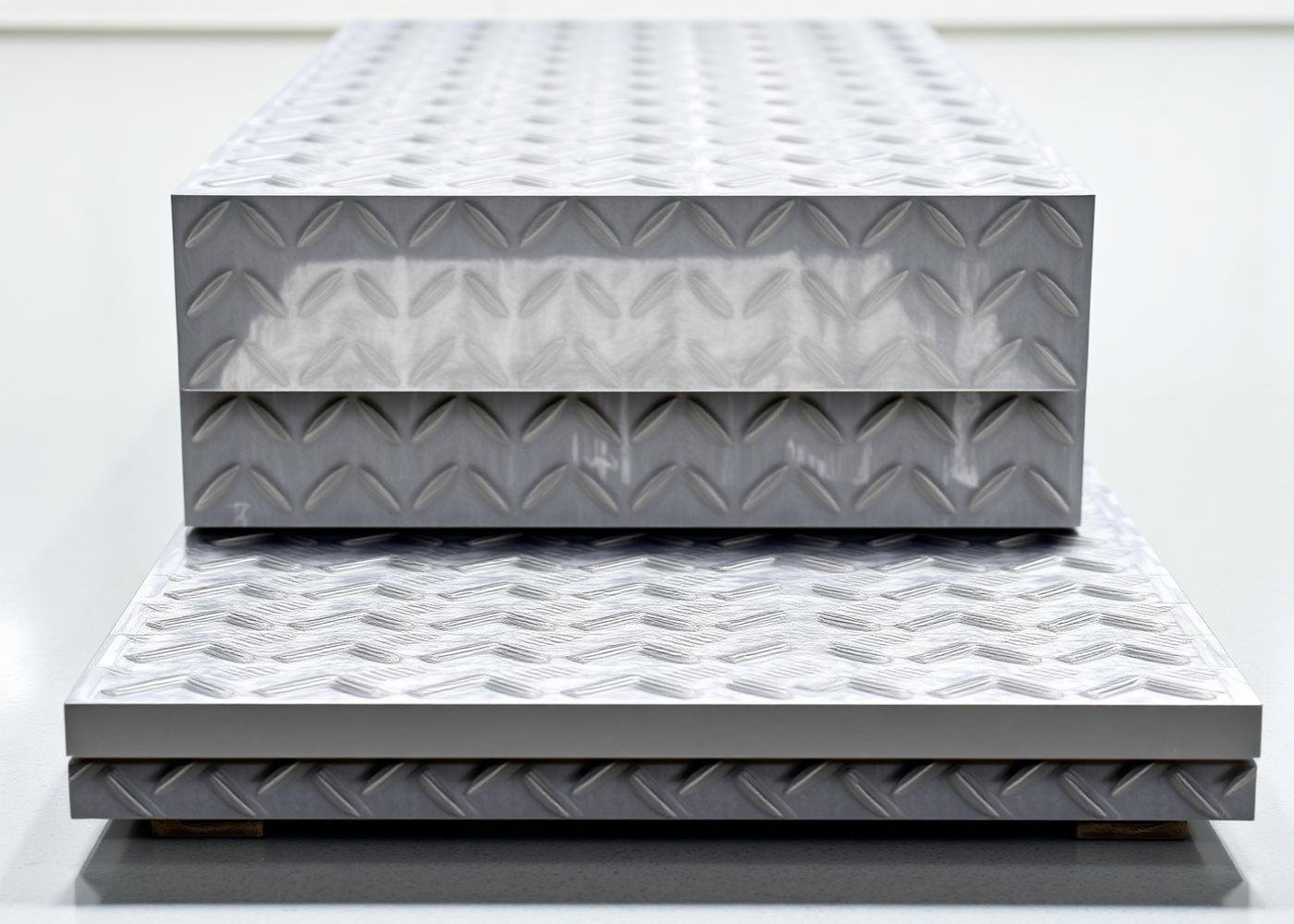 Chequered anti-slip steel plates stacked